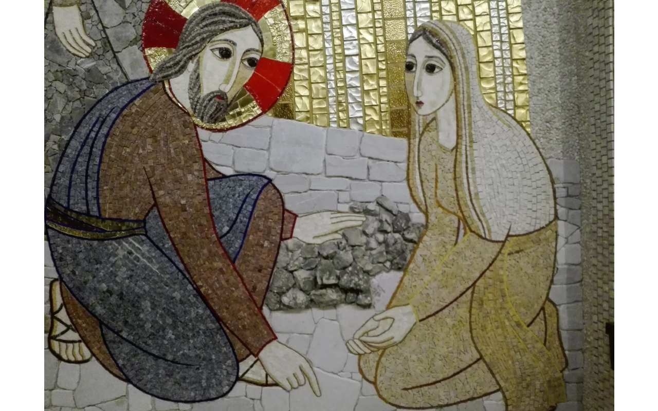 María Magdalena junto a Jesús.